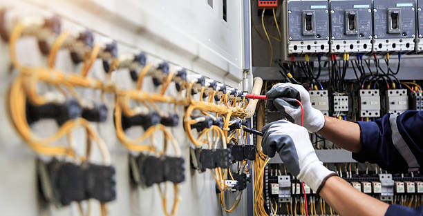 Professional Electrician technician working in Rogers, AR